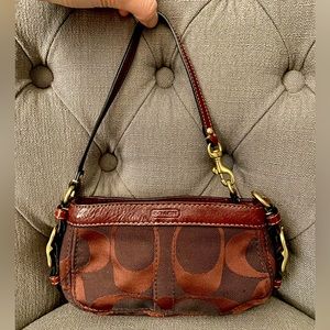 Coach Burgundy Canvas wristlet, very good condition!